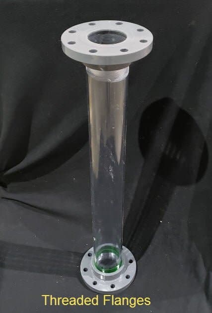 Image of transparent butyrate pipe with flanges attached by threading. Caption says "threaded flanges."
