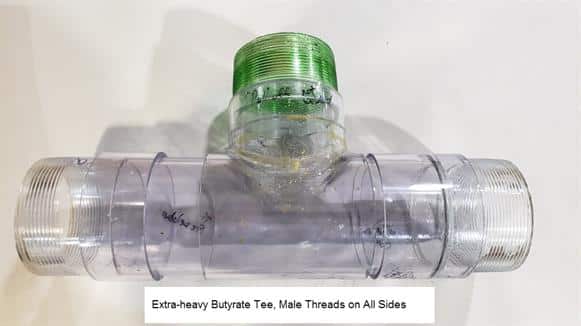 Image of transparent tubing Tee section with caption saying, "extra-heavy butyrate tee, male threads on all sides."