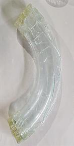A clear tubing bend section wrapped in plastic