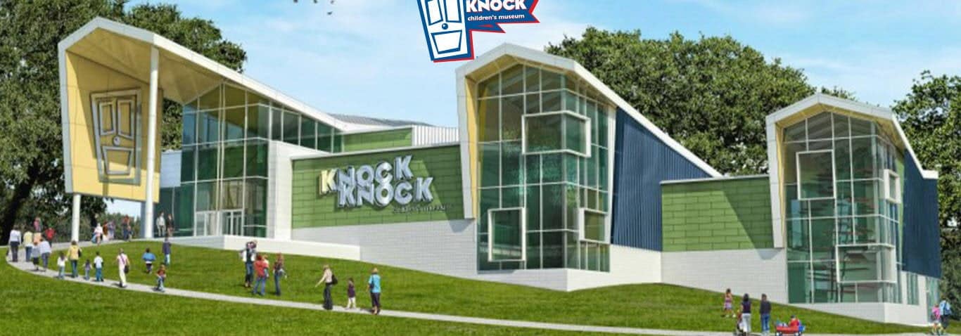 The exterior of the Knock Knock Children's Museum with visitors entering the building.