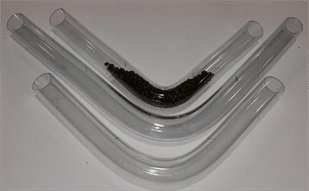 Three clear small diameter bends. The top is holding coffee beans inside