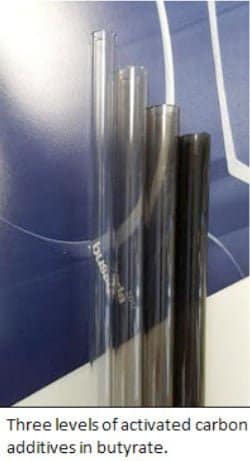 Four lengths of butyrate tubing with caption saying, "Three levels of activated carbon additives in butyrate