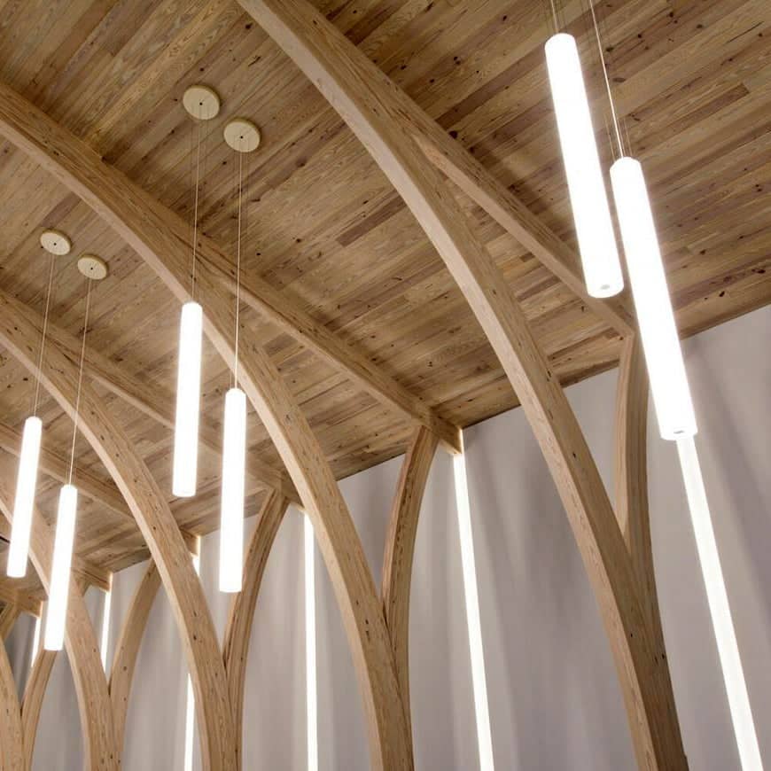 The wooden ceiling and curved rafters illuminated by LED lights covered by Stratus tubing