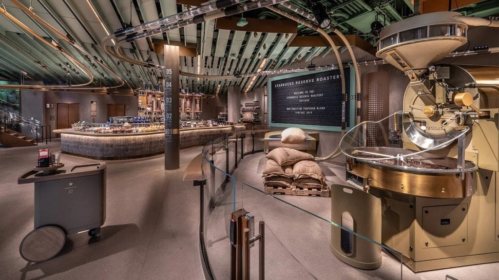 Starbucks Reserve Roastery with puck and chain conveying tube system and coffee roaster