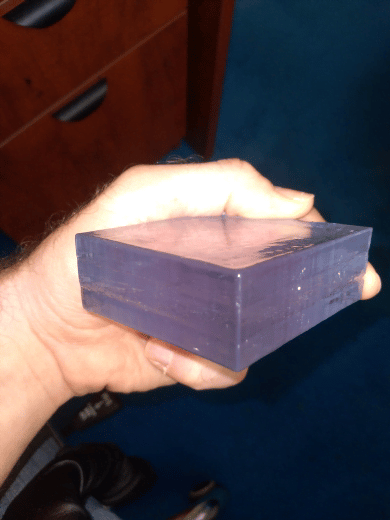 A square block of clear plastic