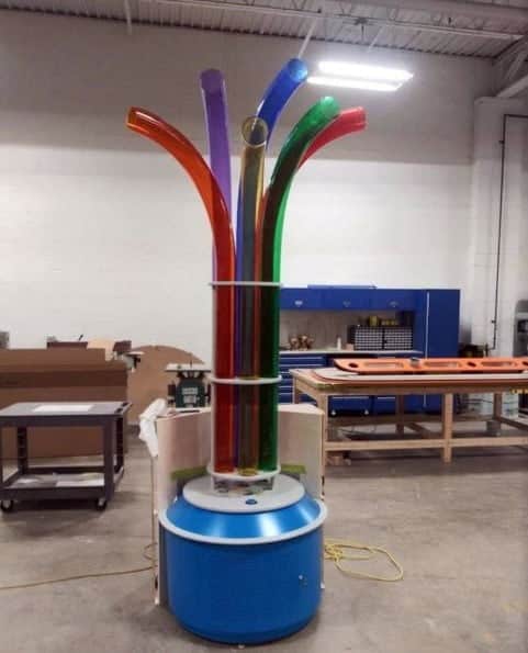 A scarf fountain made from colored rigid plastic tubing