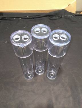 Three custom fabricated pieces made with clear Busada plastic tubing