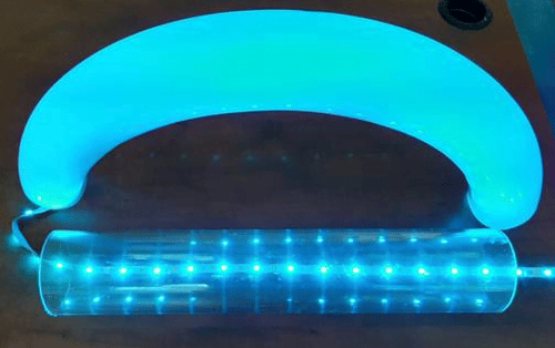 A string of blue LED lights running through a clear plastic tube and a frosted spectar stratus lighting tube.