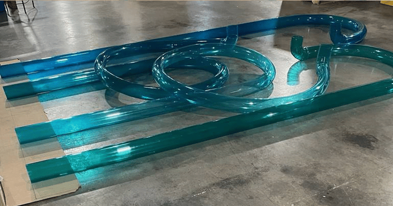 A blue tubing display with many loops and bends.