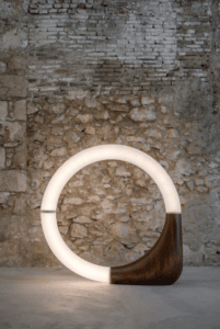 A circular artistic lighting display made with Spectar Stratus frosted rigid tubing.